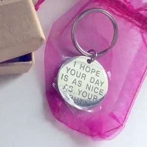 Metal Keychain in silver with message new in box